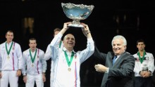 International Tennis Federation President Ricci Bitti handing over the Davis Cup to hosts Ukraine last week