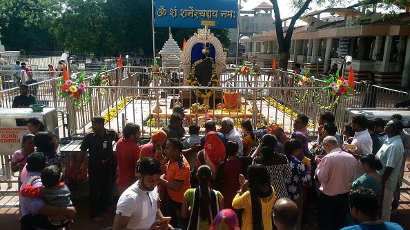 An Indian Temple lifts ban on Women’s entry after 400 Years;Indian devotees gather at The Shani Shingnapur Temple in Ahmednagar, some 200kms east of Mumbai on April 2, 2016