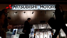 Japanese officials raid office of Mitsubishi Motors following revelation of falsified fuel economy  data.