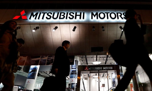 Japanese officials raid office of Mitsubishi Motors following revelation of falsified fuel economy  data.