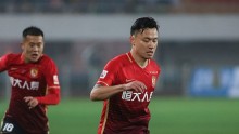Guangzhou Evergrande striker Gao Lin (R) with teammate Huang Bowen