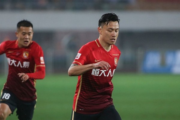 Guangzhou Evergrande striker Gao Lin (R) with teammate Huang Bowen