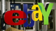 The logo of online auctioneer eBay stands outside the company's German headquarters.