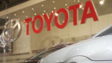 Toyota says China's new rules on emission and fuel is giving the company a hard time to reach quota.