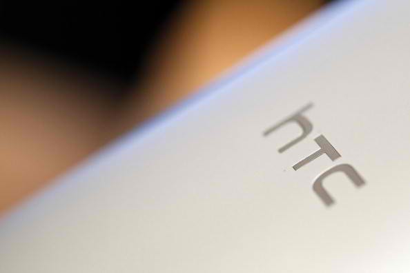 The HTC Corp. logo is imprinted on the back of the company's HTC J One HTL22 smartphone during the unveiling event in Tokyo, Japan, on Monday, May 20, 2013. 