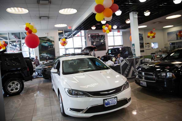 A Chrysler 200 is displayed on a showroom floor on August 6, 2014 in New York City. 