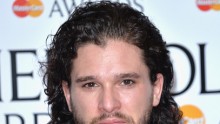 Kit Harrington poses in the winners room at The Olivier Awards.