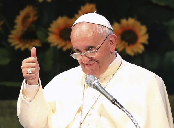 Pope Francis gestures during a meeting with Asian youths at the Solmoe Shrine in Dangjin