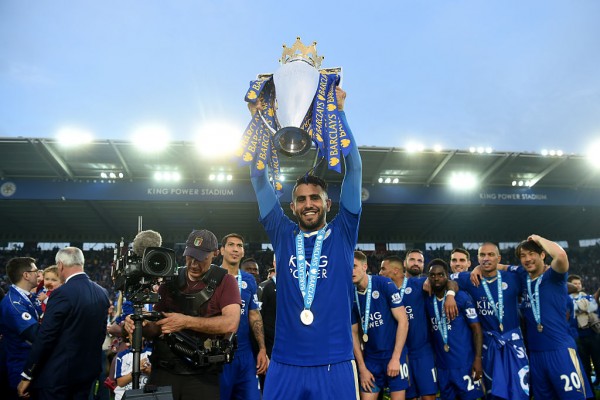 Leicester City winger Riyad Mahrez lifts the English Premier League trophy