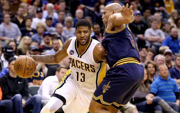 Indiana Pacers forward Paul George drives past Cleveland Cavaliers' Richard Jefferson