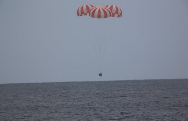 Dragon recovery team on site after nominal splashdown in Pacific.
