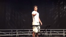 Mike Senatore flips a water plastic bottle during a high school talent show in North Carolina.