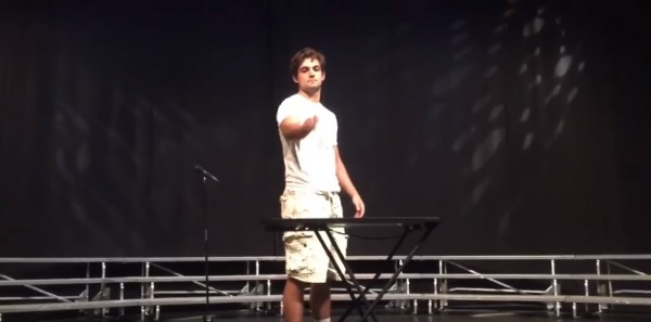 Mike Senatore flips a water plastic bottle during a high school talent show in North Carolina.