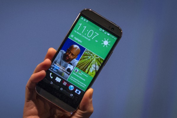 The HTC One M8 being held by HTC CEO Peter Chou