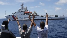 Philippine Marines Gesturing at a Chinese Vessel