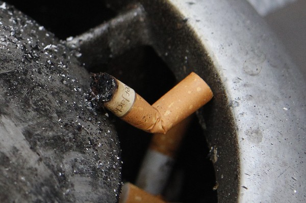 Cigarette butt in a bin