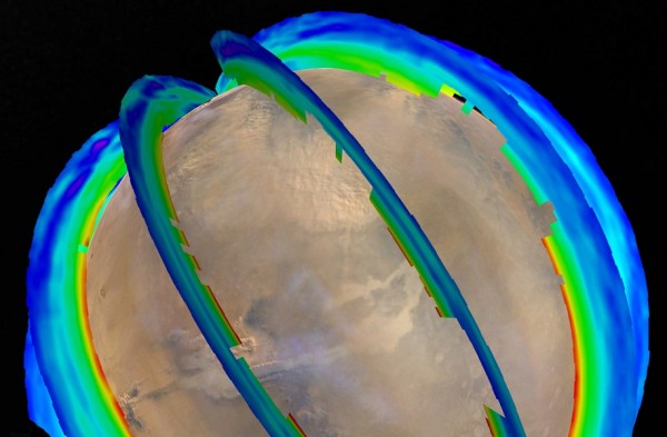 NASA Mars Orbiters Reveal Seasonal Dust Storm Pattern This graphic presents Martian atmospheric temperature data as curtains over an image of Mars taken during a regional dust storm. The temperature profiles extend from the surface to about 50 miles up. T