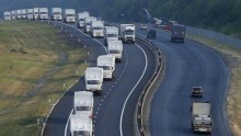 A Russian convoy of trucks carrying humanitarian aid for Ukraine travels along a road south of the city of Voronezh August 14, 2014 