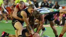 A melee breaks out during an Australian Rules Football match between the Richmond Tigers and the Melbourne Demons
