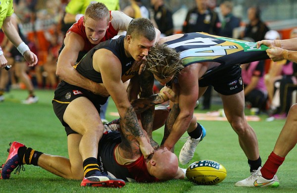 A melee breaks out during an Australian Rules Football match between the Richmond Tigers and the Melbourne Demons
