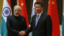 Indian Prime Minister Narendra Modi (Left) and Chinese President Xi Jinping attend a meeting on May 14, 2015 in Xian, Shaanxi province, China.