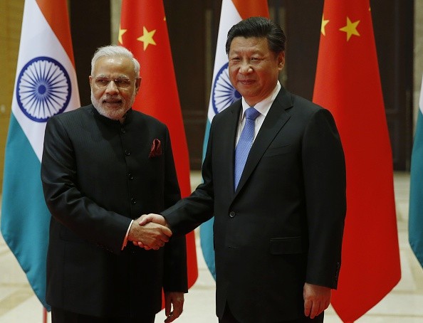 Indian Prime Minister Narendra Modi (Left) and Chinese President Xi Jinping attend a meeting on May 14, 2015 in Xian, Shaanxi province, China.