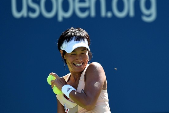 A renegade bee interrupts Japanese Kimiko Date-Krumm's serve during her match against Venus Williams at the US Open in Flushing Meadows