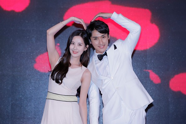 South Korea singer and actress Seohyun and Chinese actor Zhang He attend a press conference for an internet drama in Beijing, China.