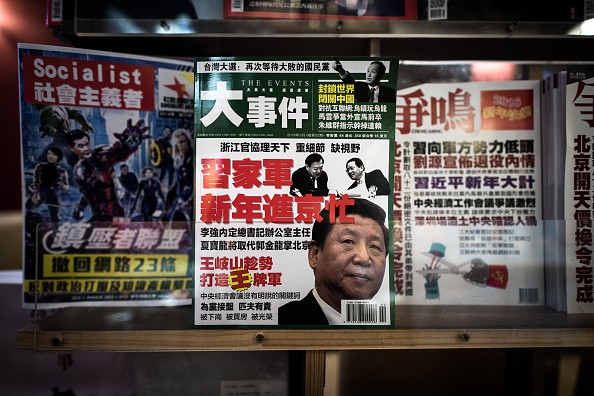 Wang Jianmin and Guo Zhongxiao published magazines that reported on political gossip in China.