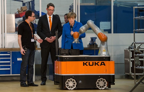 Chancellor Merkel Visits KUKA Robotics Factory