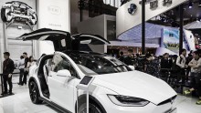 A Tesla Motors Inc. Model X electric sport utility vehicle (SUV) stands on display at the Beijing International Automotive Exhibition in Beijing, China, on Monday, April 25, 2016. 