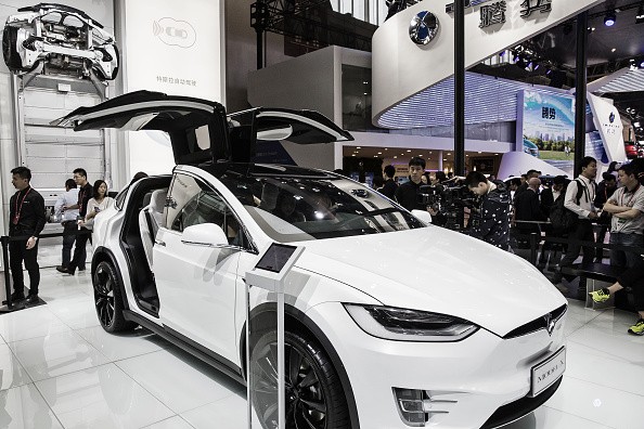 A Tesla Motors Inc. Model X electric sport utility vehicle (SUV) stands on display at the Beijing International Automotive Exhibition in Beijing, China, on Monday, April 25, 2016. 