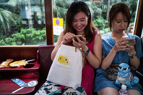  People join the Hong Kong's first Pokemon Go tram party organized by 'Sam the Local', on July 30, 2016 in Hong Kong.