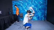  A visitor tries VR gadgets a day before the official opening of the Taobao Maker Festival.