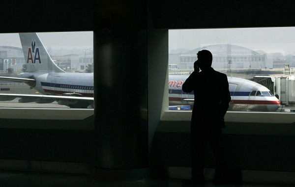 A man talks on a cell phone in the new American Airlines terminal at John F. Kennedy International Airport July 27, 2005 in New York City. 