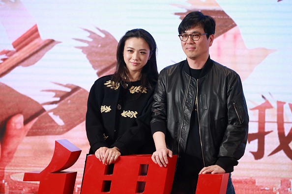 Actress Tang Wei and her husband South Korean director Kim Tae-yong attend the press conference of director Xue Xiaolu's film 'Book of Love' on April 24, 2016 in Beijing, China.