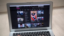 In this photo illustration, the BBC iPlayer app is displayed on a laptop screen as hands touch its keyboard on August 2, 2016 in London, England.