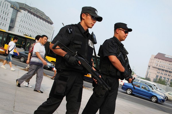 Armed police officers patrol the streets 