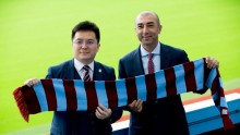 Aston Villa's Dr. Tony Xia (L) and Roberto Di Matteo