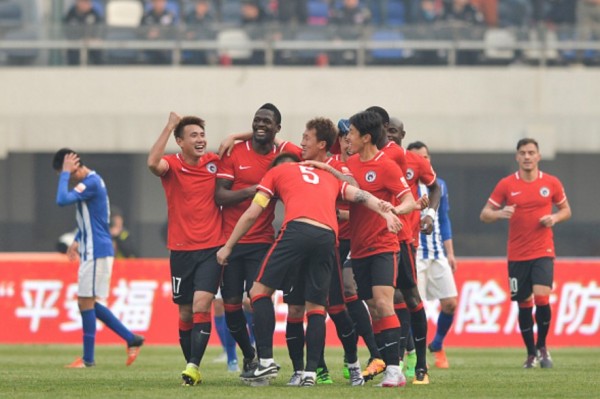 Liaoning Whowin players celebrate after a goal