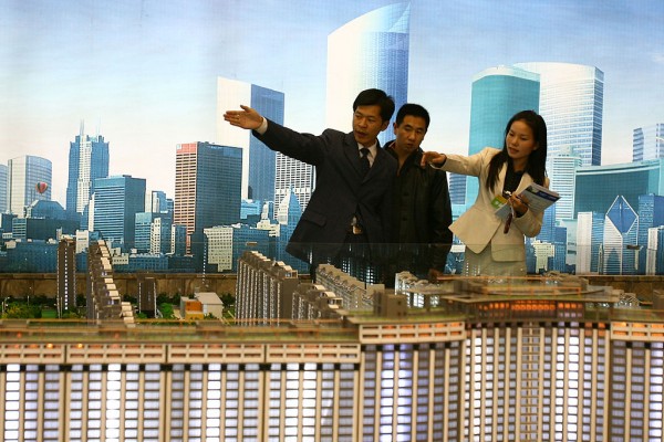 China has been urged to take steps about unchecked expansion of its housing market. 