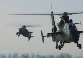 China Showcases Newest Attack Helicopters and Battle Tanks In Multinational Military Exercises