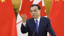 Chinese Premier Li Keqiang addresses a press conference 