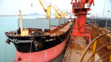A freighter docks at Lianyungang Port in Lianyungang, Jiangsu Province of China.