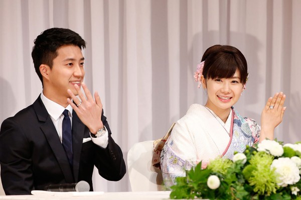 Hung-Chieh Chiang of Chinese Taipei and Ai Fukuhara of Japan show their engagement ring during press conference on September 21, 2016 in Tokyo, Japan. 