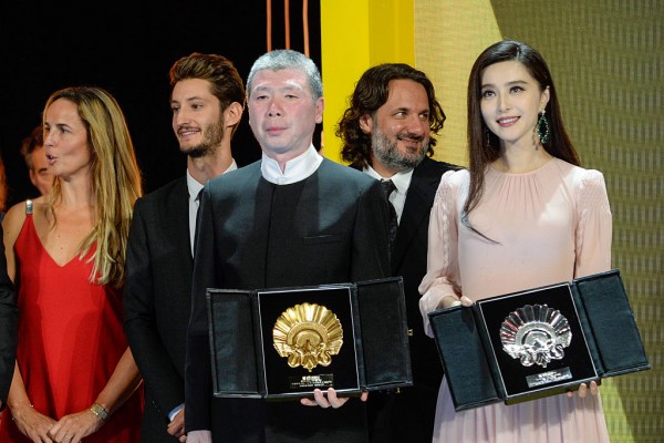 Feng Xiaogang (L) and Fan Bingbing (R) receive Best Film Award for 'I Am Not Madame Bovary' film and Silver Shell for Best Actress for 'I am Not Madame Bovary' film during the closing ceremony of the 64th San Sebastian Film Festival at Kursaal on Septembe