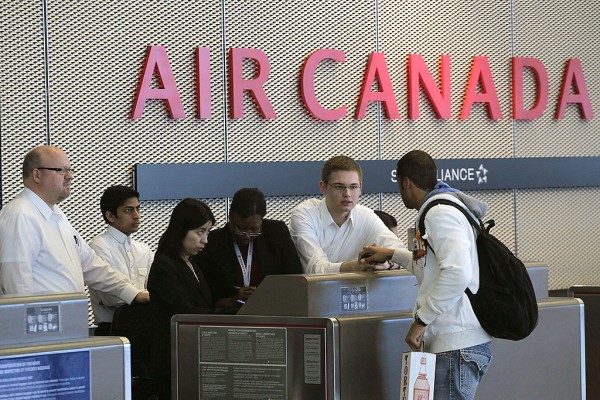  A passenger checks in for an Air Canada flight at O'Hare International Airport February 3, 2011 in Chicago, Illinois.