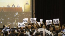 Protesters disrupt Deputy Secretary-General Li Fei's explanation on China's decision against democracy