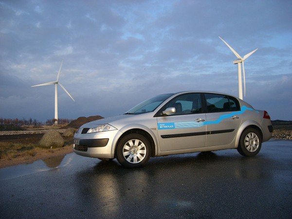 In this handout photo provided by Project Better Place on May 11, 2008, Renault's electric car, built on the Megane model, is parked nearby wind turbines in Denmark. 
