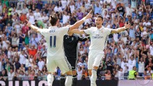 Real Madrid forward Cristiano Ronaldo (R) celebrates with teammate Gareth Bale after scoring a goal